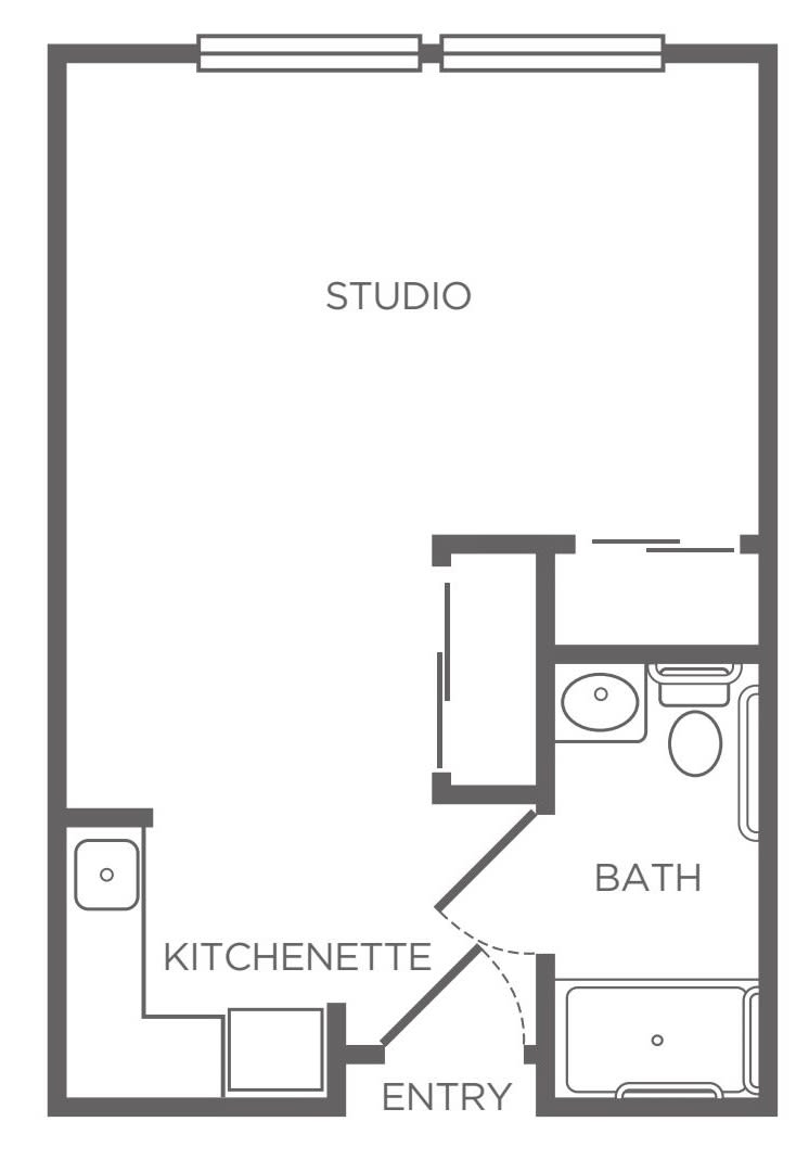 A floor plan of a studio apartment featuring a bathroom and kitchenette.