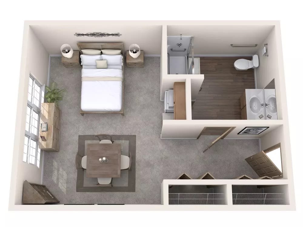A compact studio apartment floor plan featuring a bedroom, bathroom, and living area.