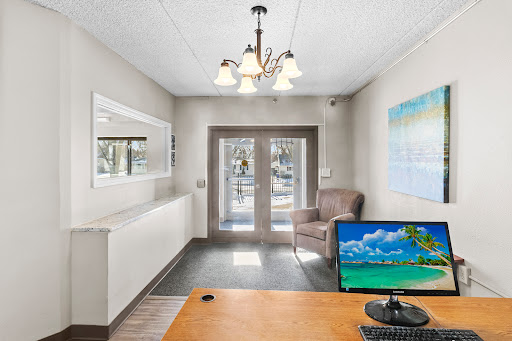 A welcoming lobby space featuring comfortable seating, modern decor, and ample natural light.