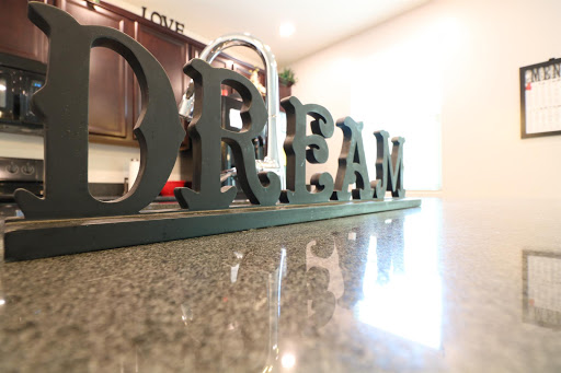 A stylish decorative piece that inspires dreams in a cozy kitchen setting.