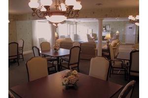 Elegant dining area with cozy seating and ambient lighting.