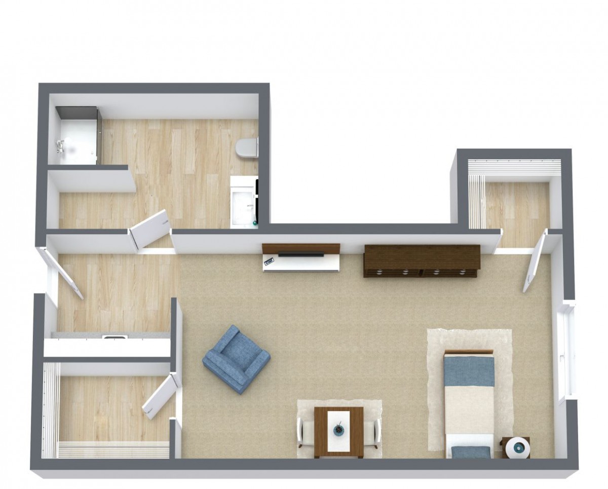 A top-down view of a modern apartment floor plan showcasing the layout and furniture arrangement.