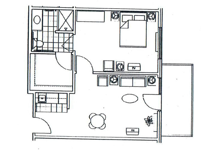 A detailed floor plan of a one-bedroom apartment featuring a kitchen, living area, and bathroom.