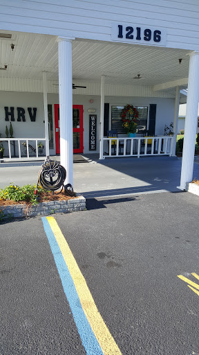 Entrance of a building with decorative elements and a welcoming atmosphere.