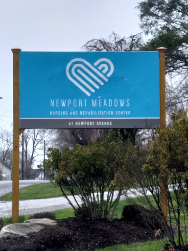 Sign for Newport Meadows, a healthcare and rehabilitation center.