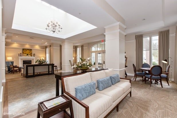 A modern living room with elegant furniture and bright, open spaces.