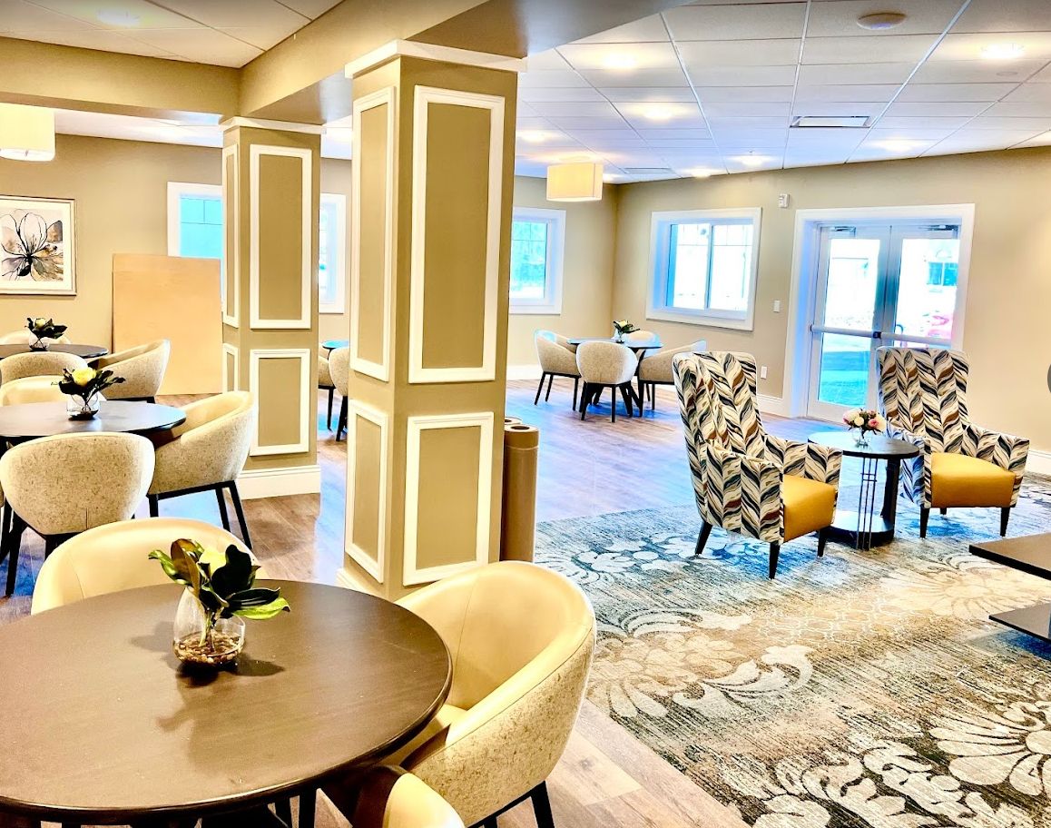 A modern and stylish lounge area featuring comfortable seating and elegant decor.