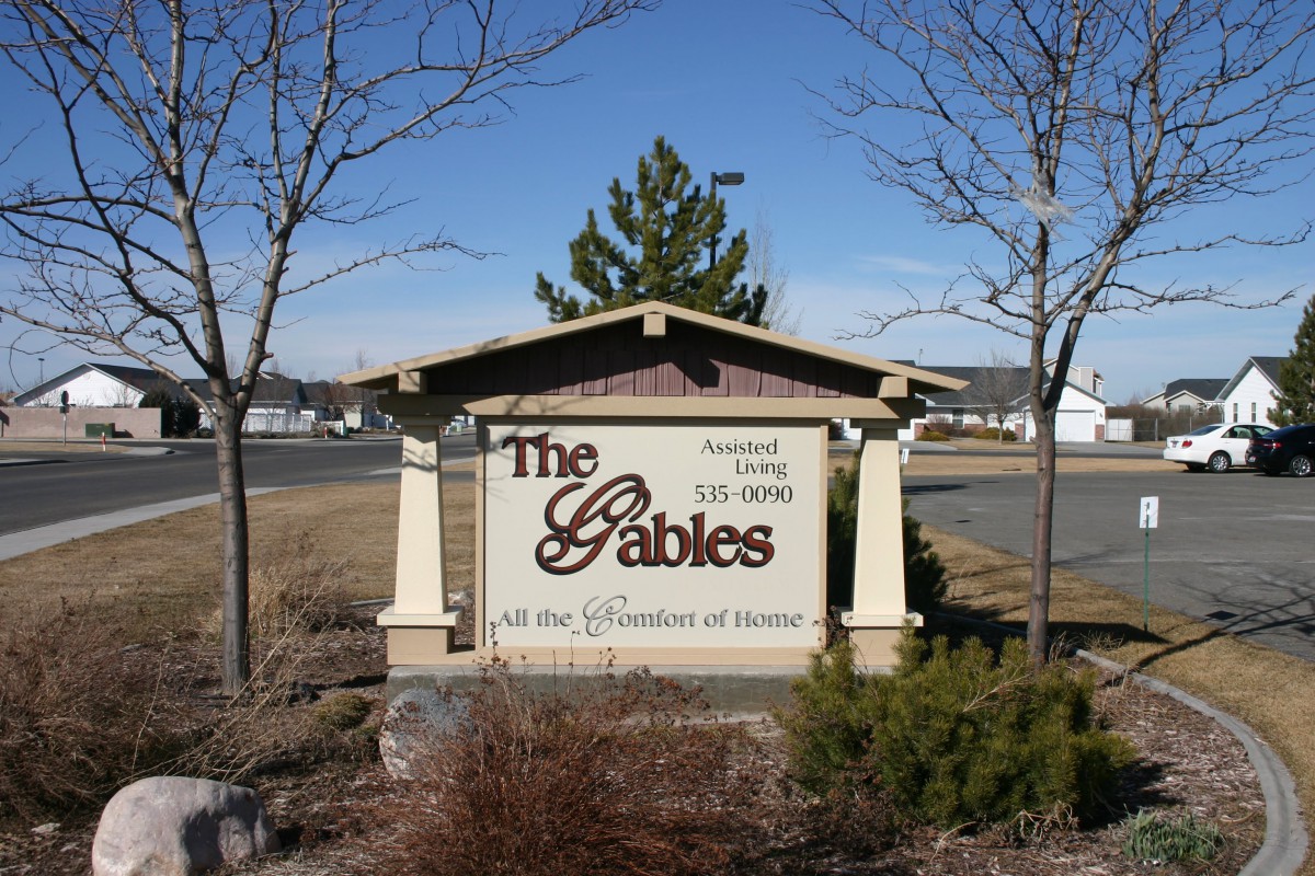 Entrance sign for 'The Gables' community.