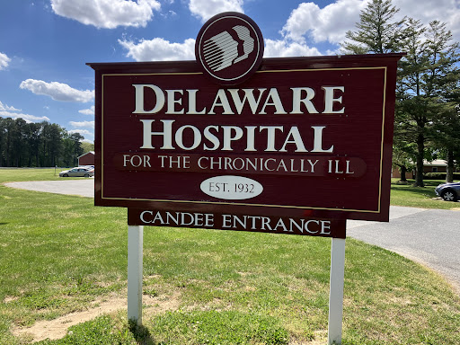 Sign for Delaware Hospital for the Chronically Ill, indicating the Candise Entrance.