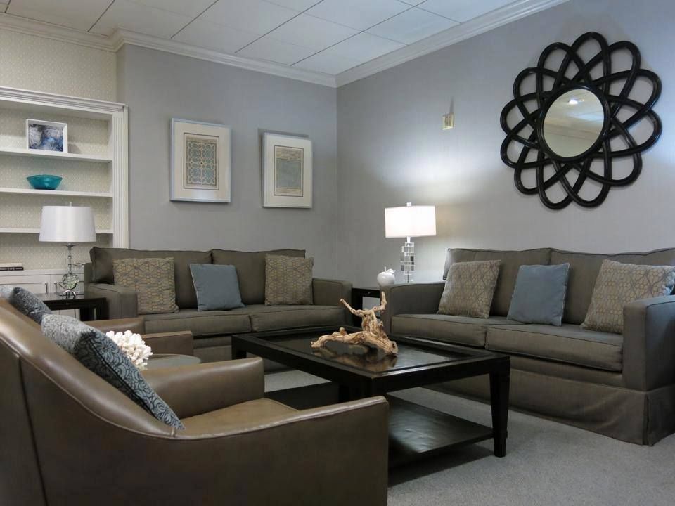 A modern living room with stylish furniture and decor.