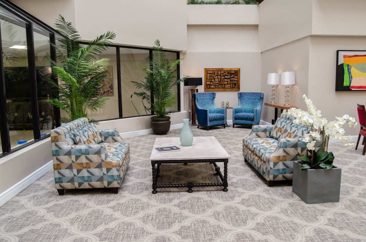 A modern lobby with comfortable seating and stylish decor.