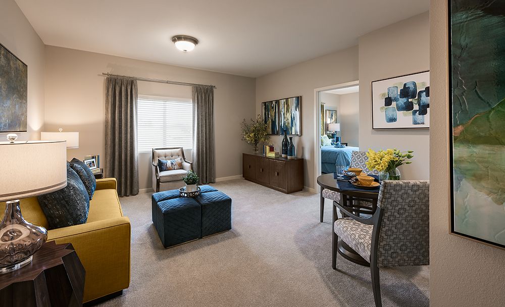A modern living room interior with elegant furniture and decor.