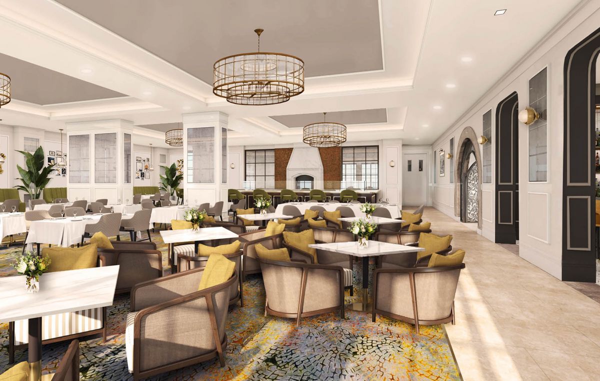 A stylish and modern lounge area with comfortable seating and elegant chandeliers.