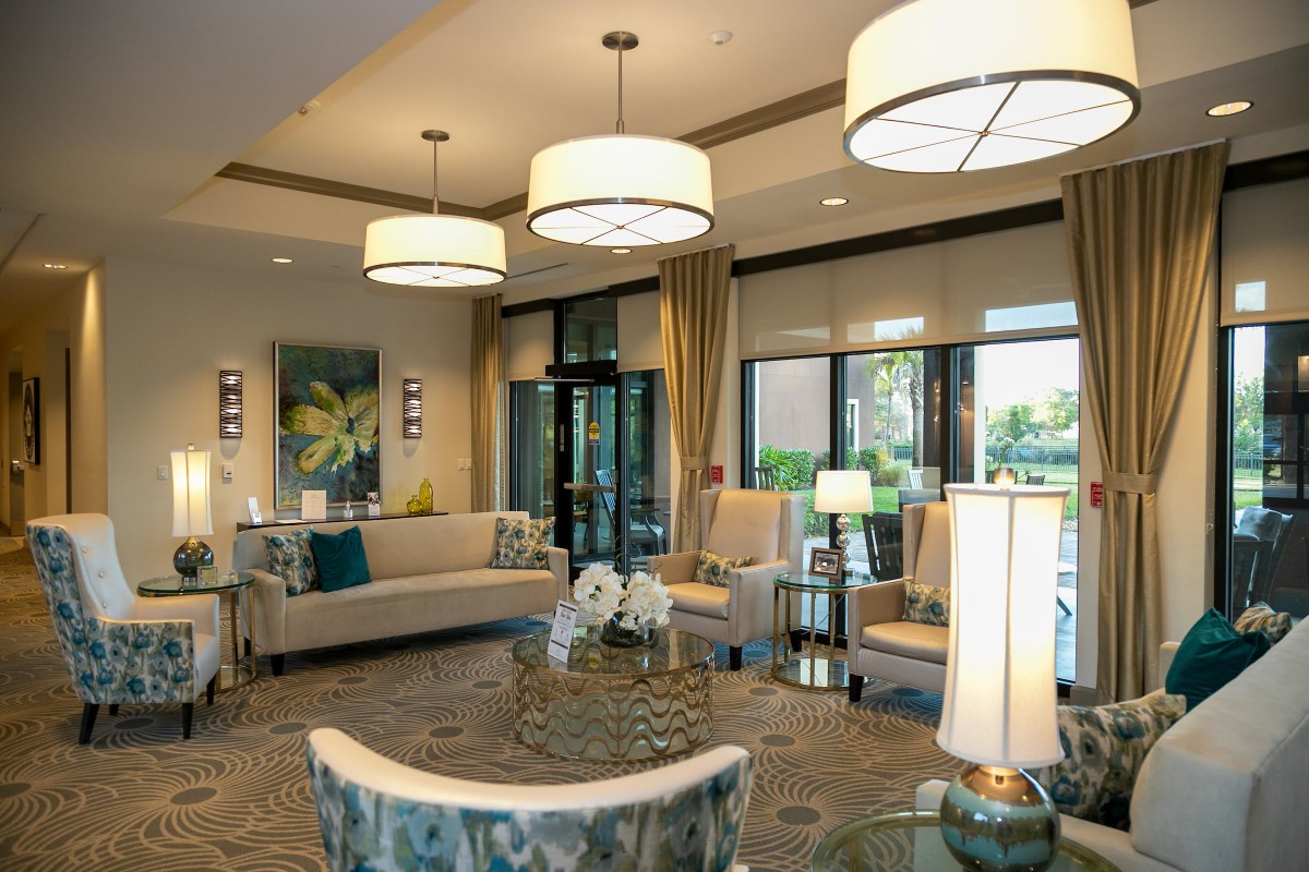 A modern lobby area with comfortable seating and elegant lighting.