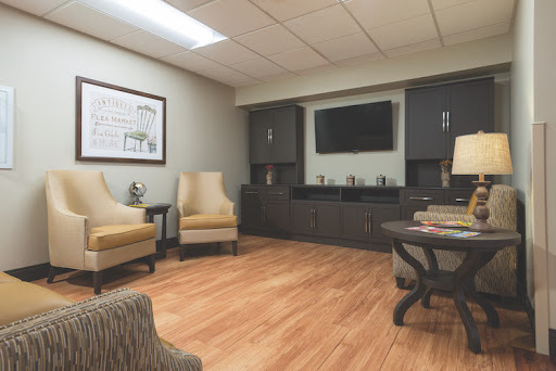 A modern and inviting waiting area featuring comfortable seating and minimalist decor.
