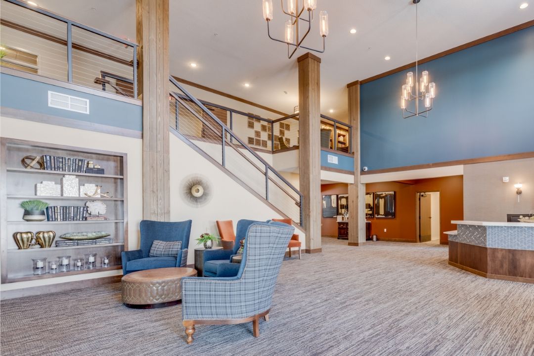 A spacious and elegantly designed lobby with comfortable seating and modern decor.