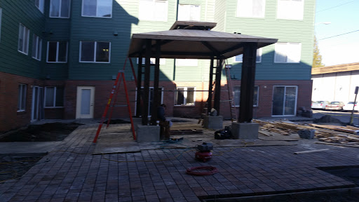 A gazebo under construction in an outdoor setting.