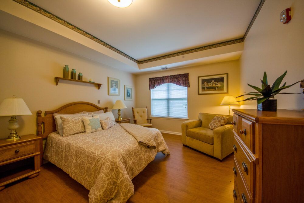 A cozy bedroom with warm lighting and elegant decor.