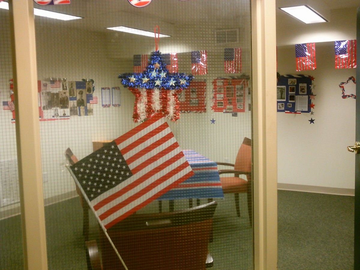 An office decorated with American flags and patriotic decor.