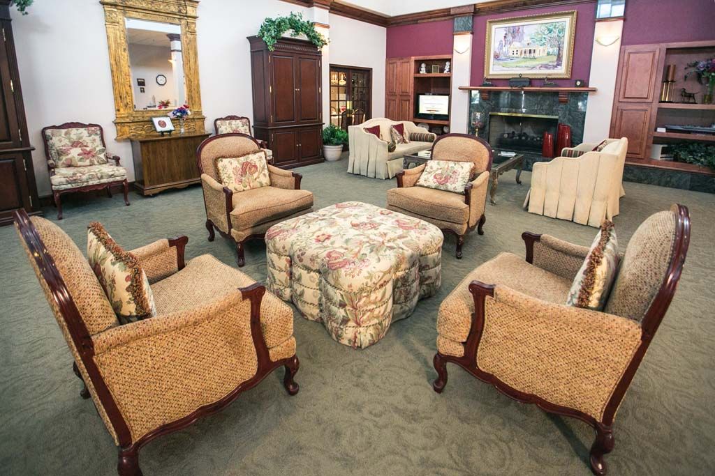 A cozy living room with classic furniture and elegant decor.