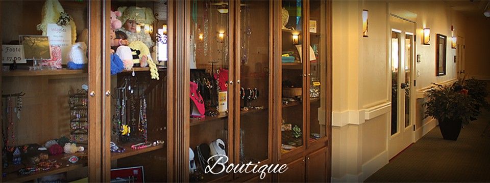 A boutique display case showcasing a selection of fashion accessories.