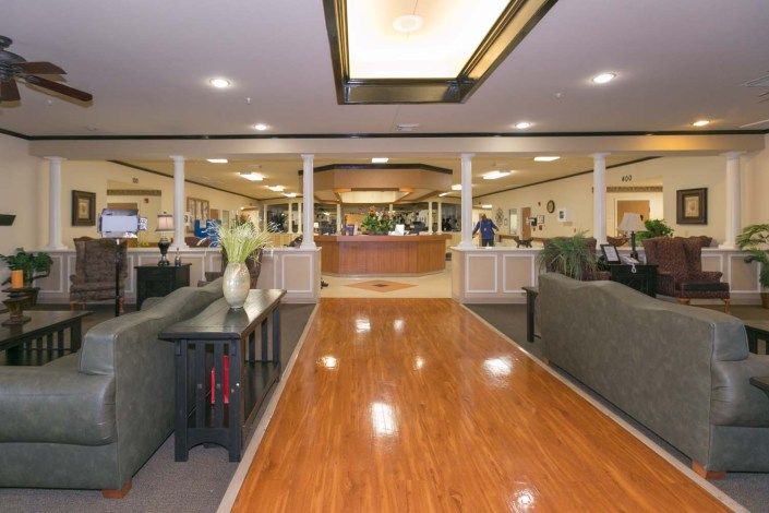 Spacious hotel lobby with comfortable seating and welcoming reception desk.