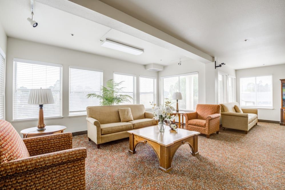A bright and modern living room with comfortable seating.