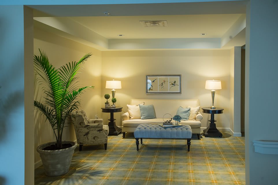 A cozy living room with elegant furniture and soft lighting.
