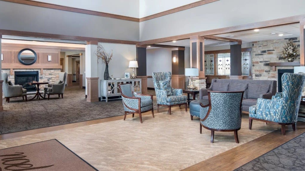 A modern lobby area with elegant furnishings and lighting.