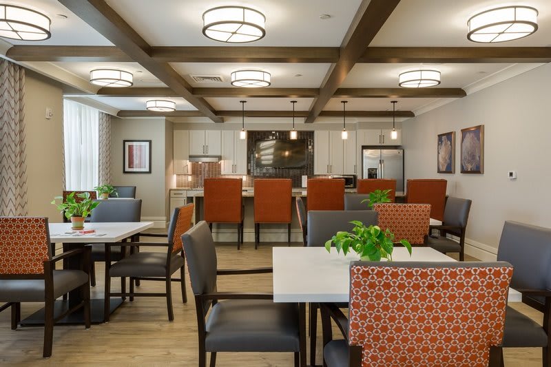 A modern dining area with stylish seating and contemporary lighting.