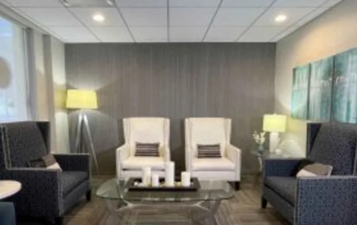 A modern lobby with comfortable seating and stylish decor.