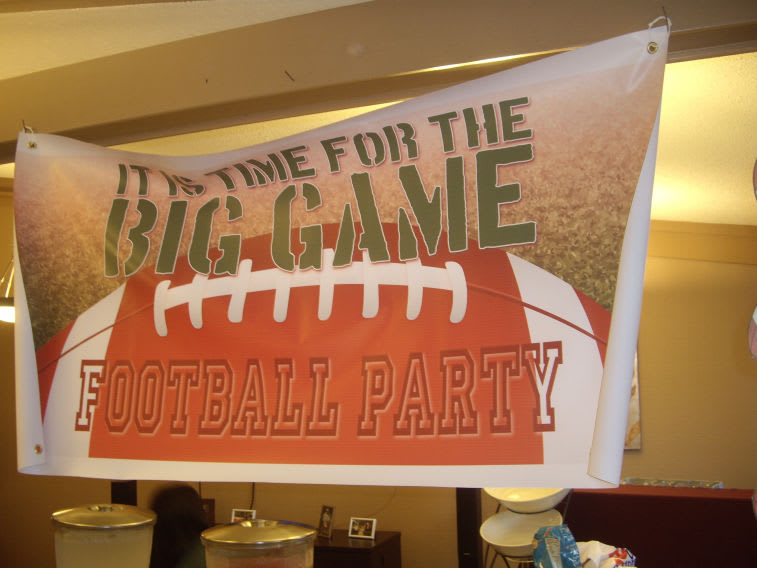 A banner with a football theme promoting a big game party.