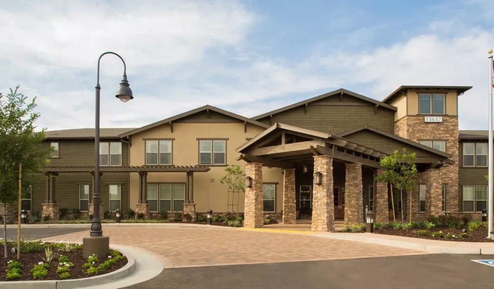 A modern residential building with a welcoming entrance and contemporary architectural design.