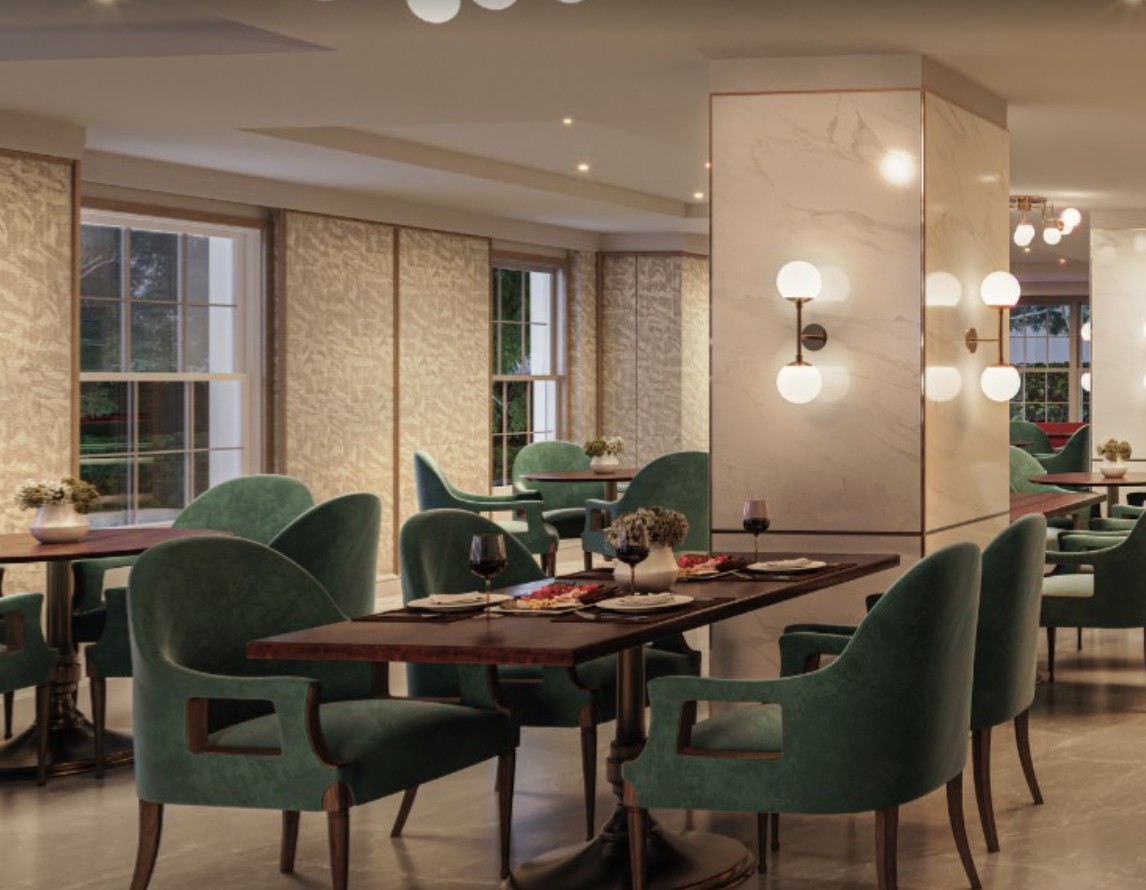 A stylish restaurant interior featuring modern decor with green chairs and elegant lighting.