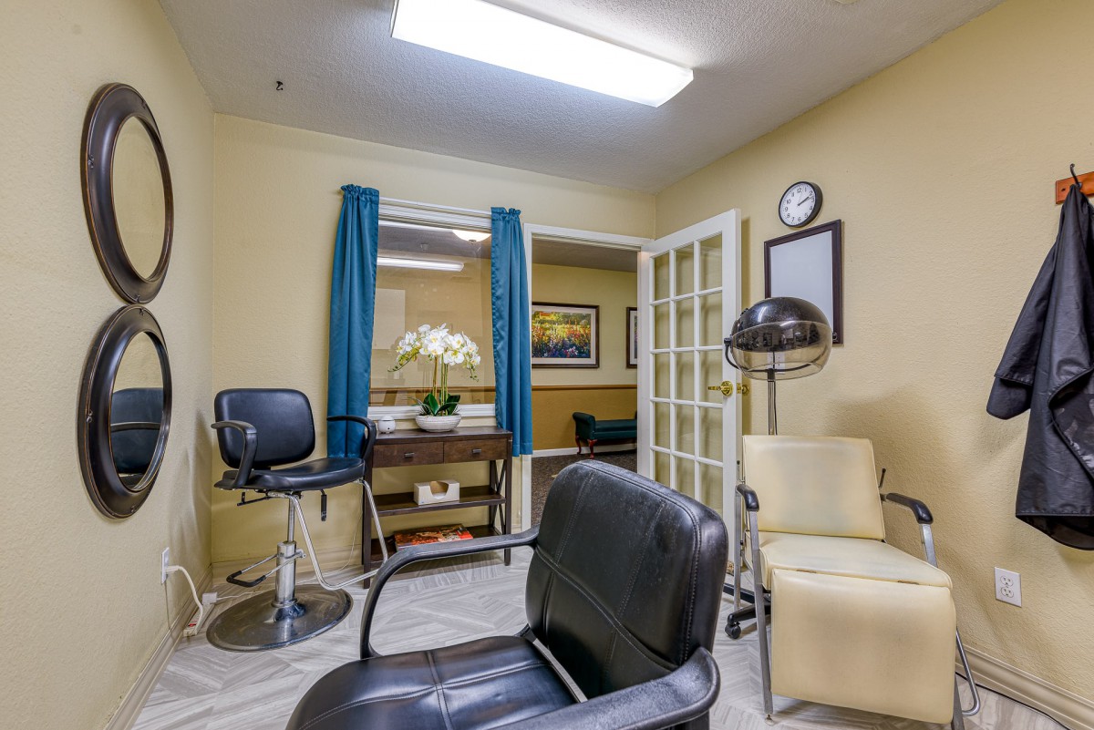 A cozy hair salon interior with stylish furniture and decor.