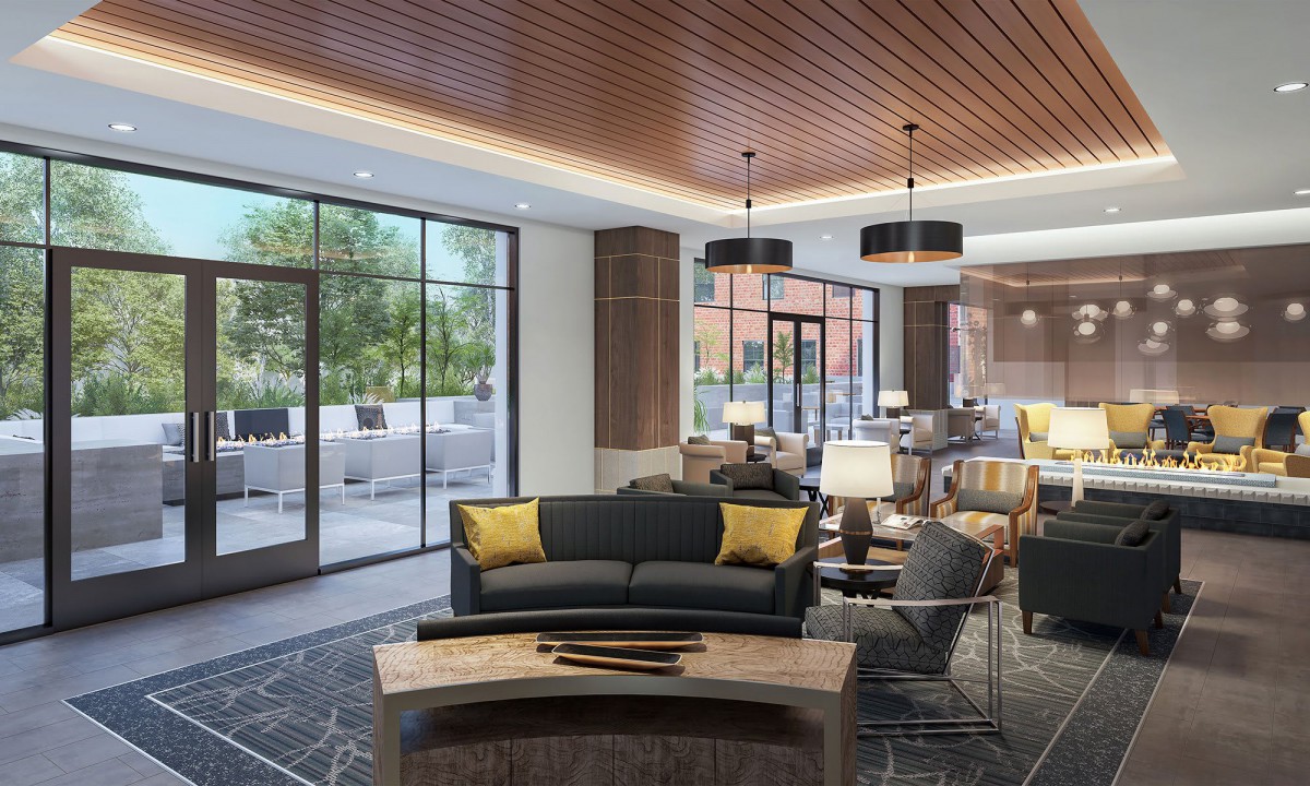 A modern lobby area featuring comfortable seating and stylish decor.