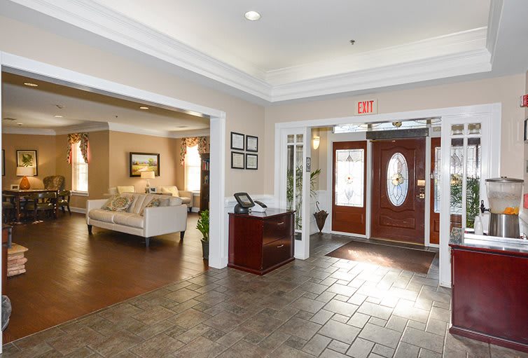 A welcoming lobby area with comfortable seating and a reception desk.