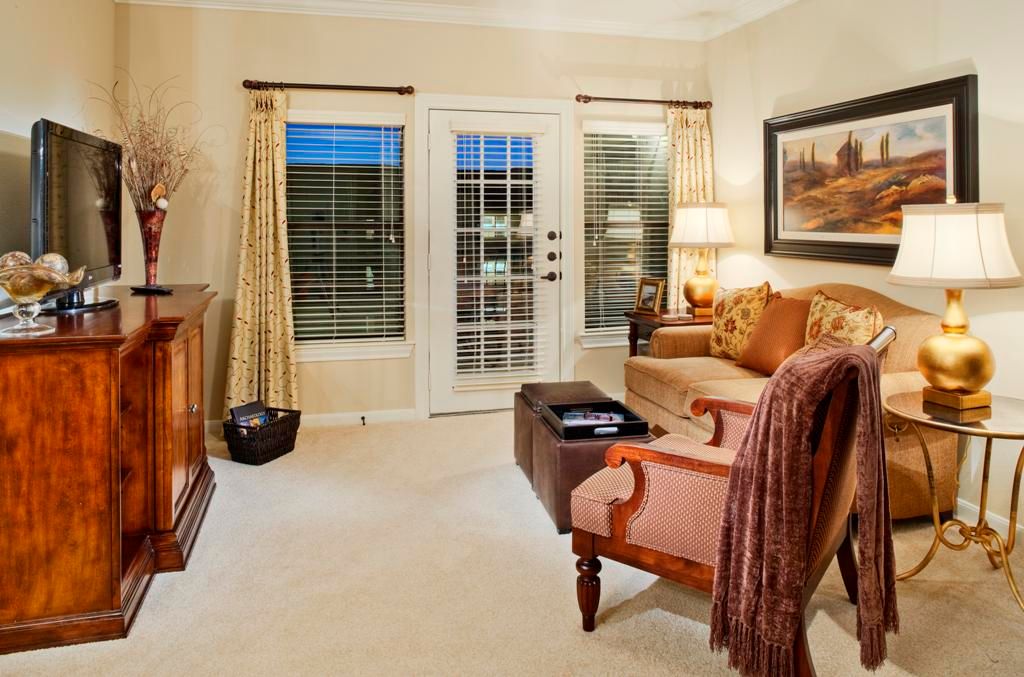 A cozy living room with elegant furniture and soft lighting.