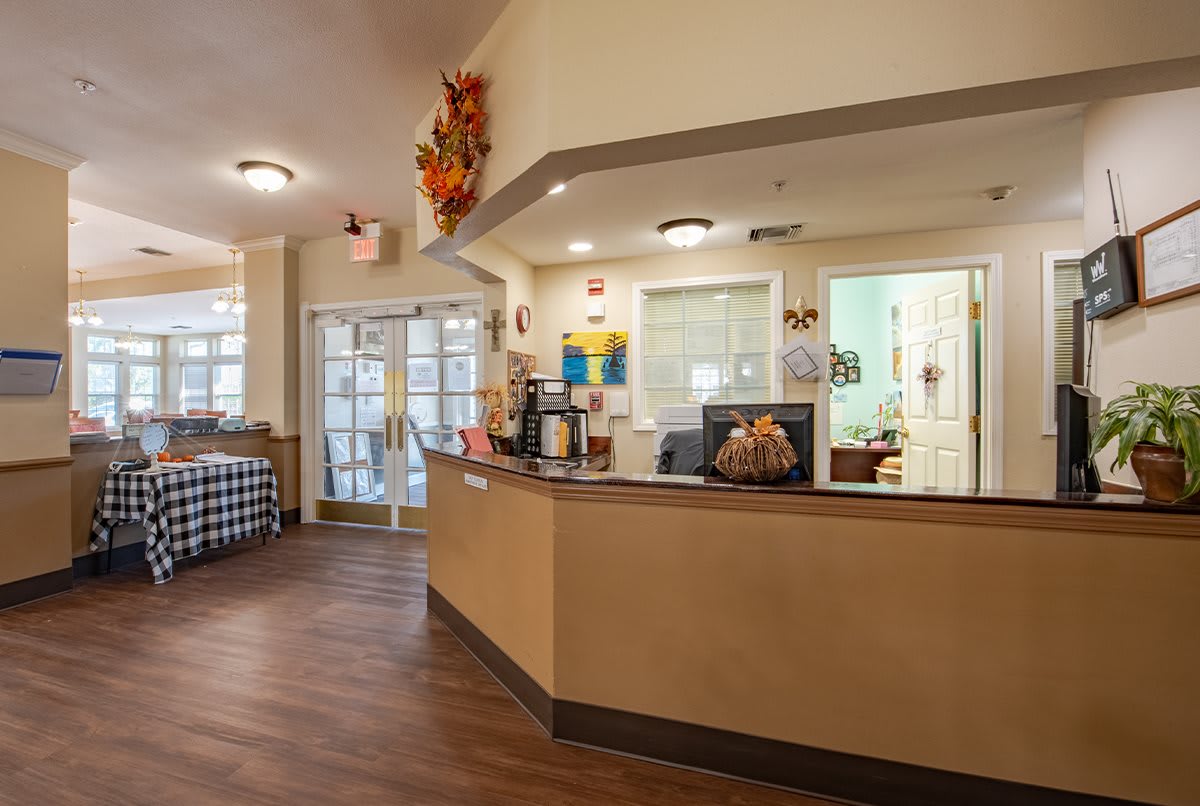 A welcoming reception area with a desk and seasonal decor.