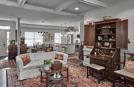 A beautifully designed modern living room featuring a cozy atmosphere with elegant furniture and decor elements.