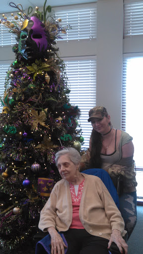 A joyful holiday moment captured with a beautifully decorated Christmas tree.