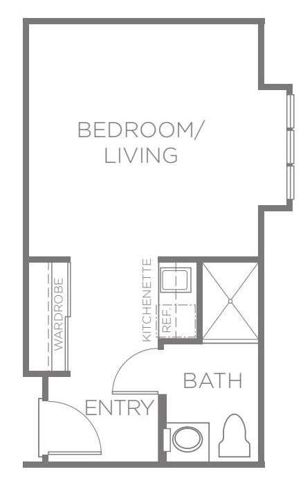 A floor plan of a studio apartment featuring a combined bedroom and living area, kitchenette, and bathroom.