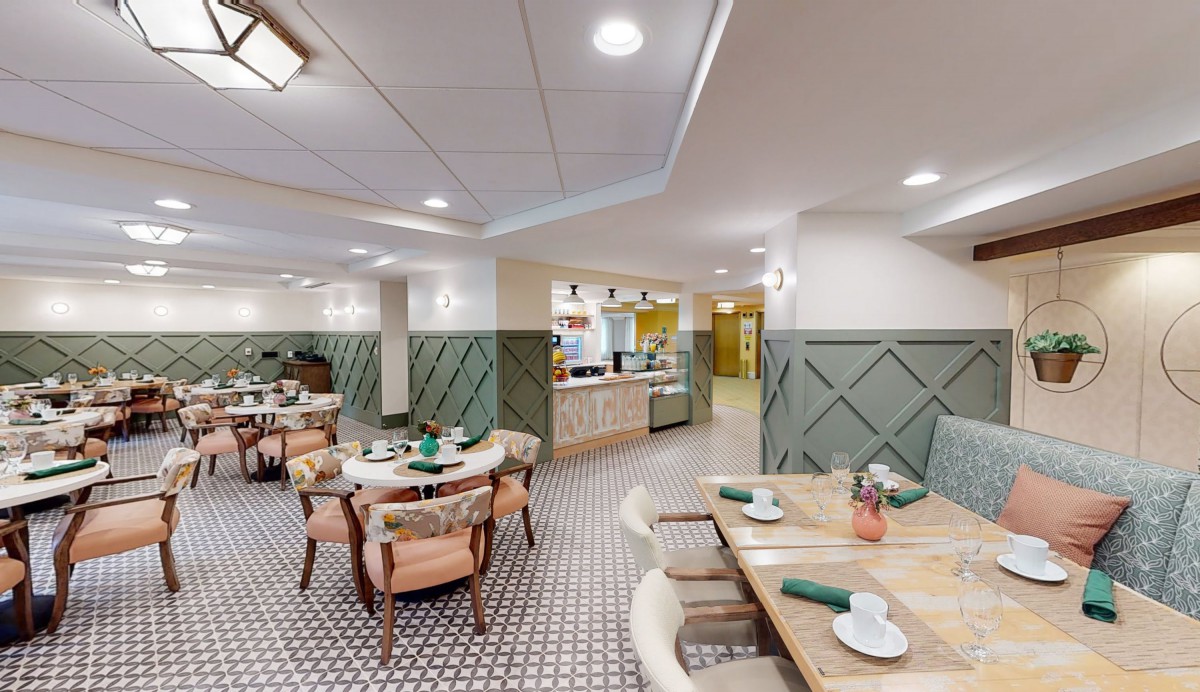 A modern restaurant dining area with stylish furniture and elegant decor.