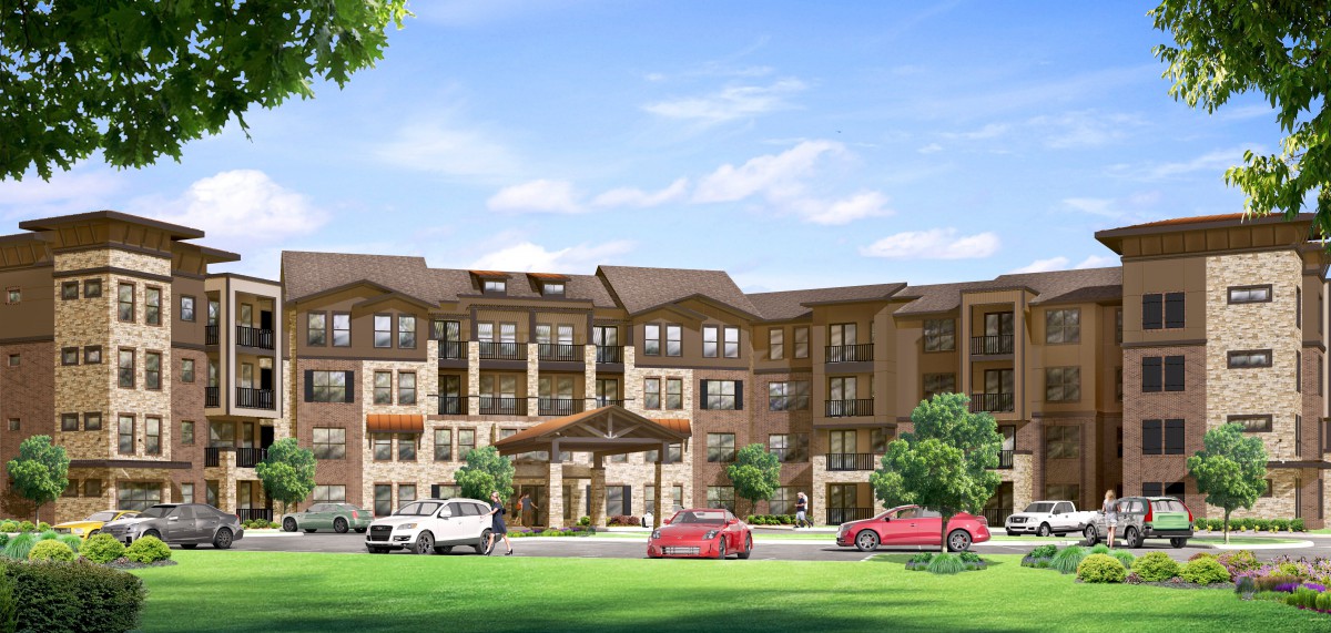A multi-story residential building with cars parked in front, surrounded by greenery and trees.