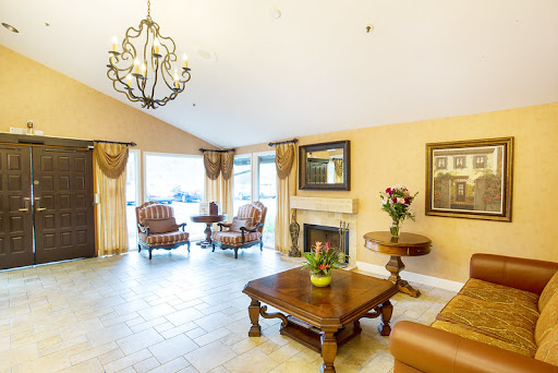A cozy and elegantly designed living room featuring warm colors, stylish furniture, and a welcoming atmosphere.