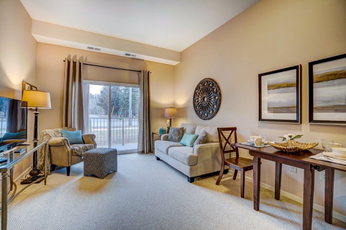 A cozy living room with comfortable seating and tasteful decor.
