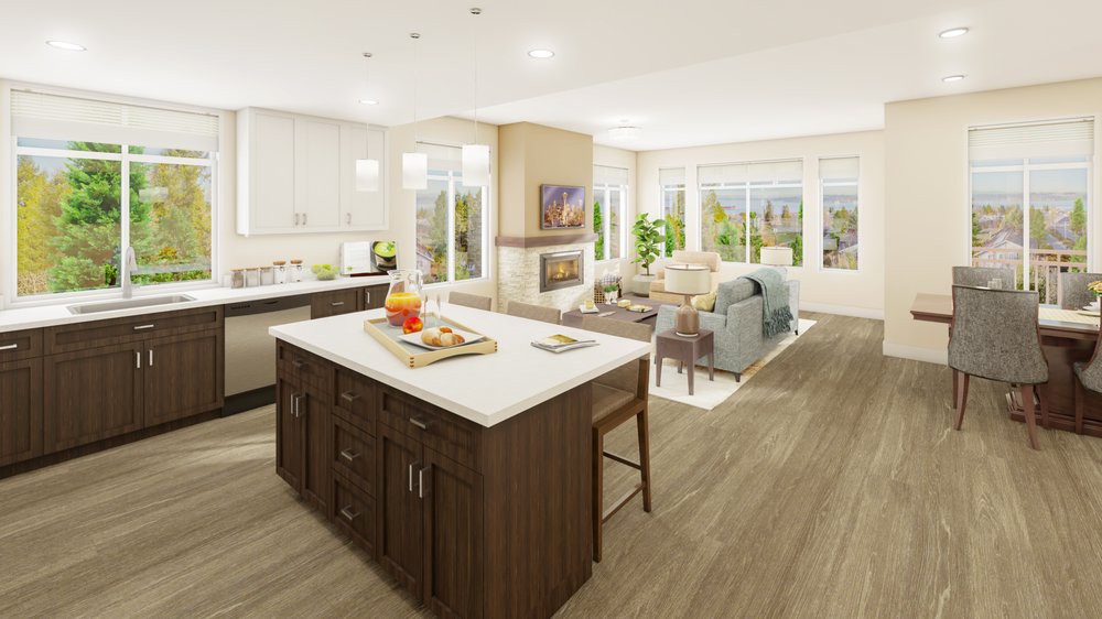 A modern open floor plan featuring a bright kitchen and cozy living area.