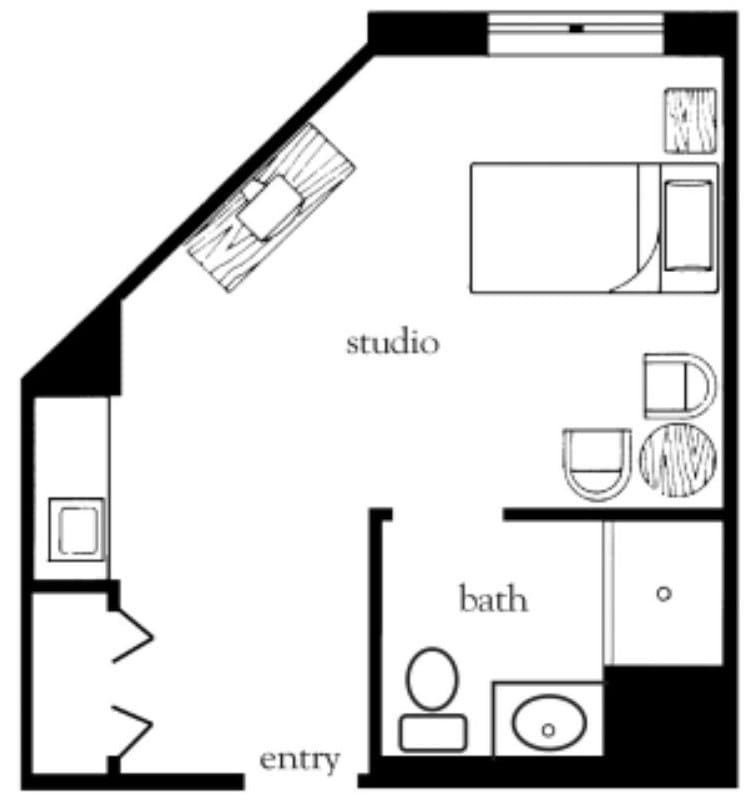 A floor plan of a studio apartment featuring an entryway, a combined living and sleeping area with a kitchen, and a separate bathroom.