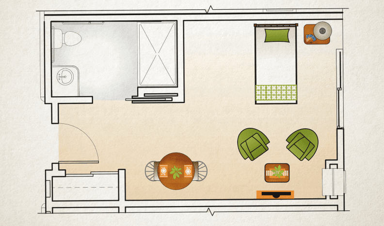 A simple floor plan depicting a living area with a bedroom, dining table, and seating area.