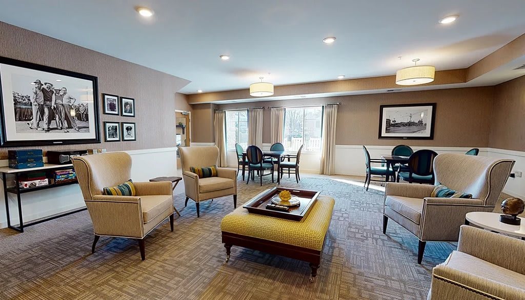 A cozy living room with comfortable seating and elegant decor.